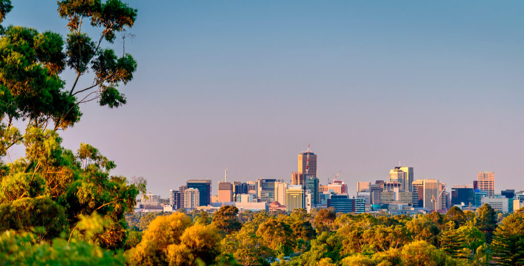 Adelaide skyline with parklands in foreground.