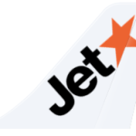 Airplane tail showing Jetstar logo